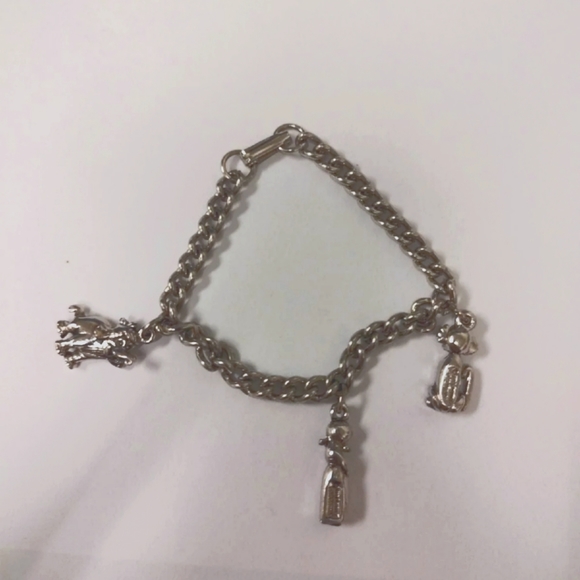 Disney Jewelry - Vintage Jungle book bracelet with 3 charms.